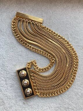 Henri Bendel HB An antique plated gold